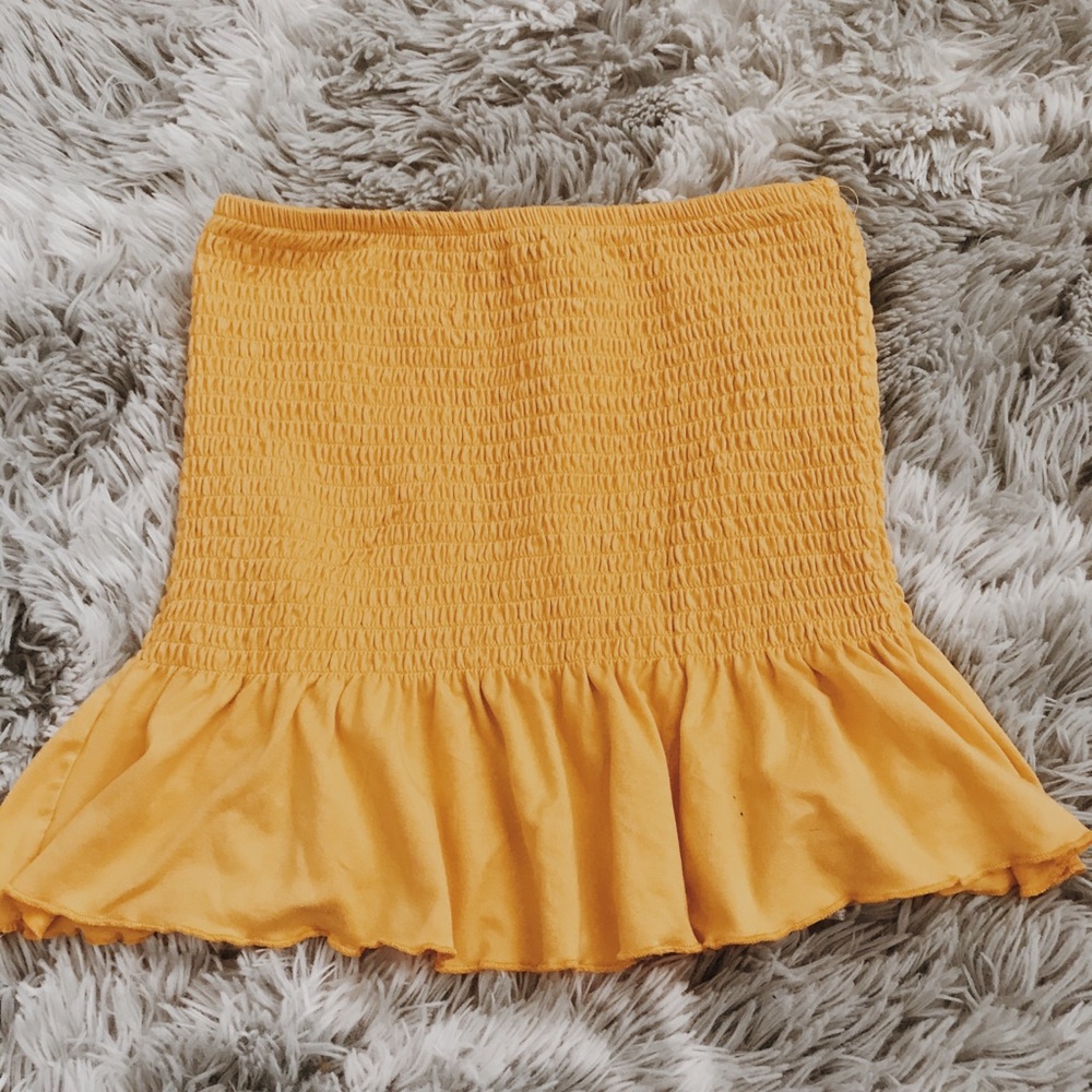yellow tube top w/ ruffles at the bottom !